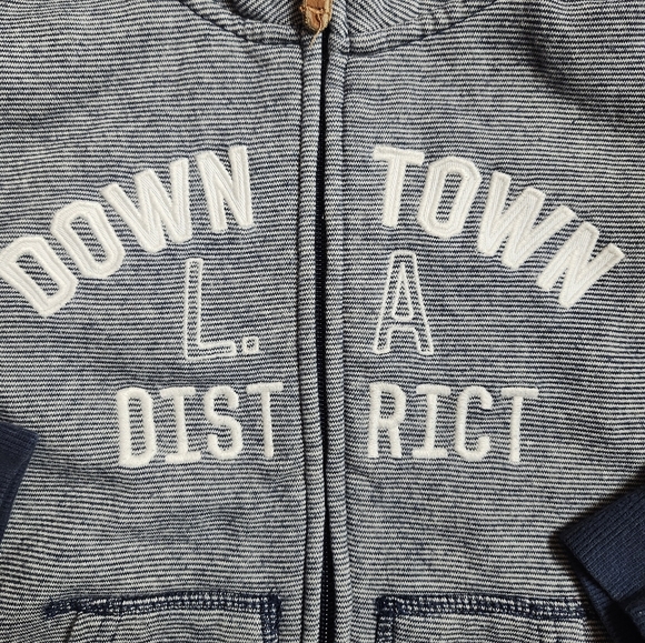 H&M Soft Sweatshirt Jacket With a Motif At Front. Lined hood. zip at front - Picture 3 of 6